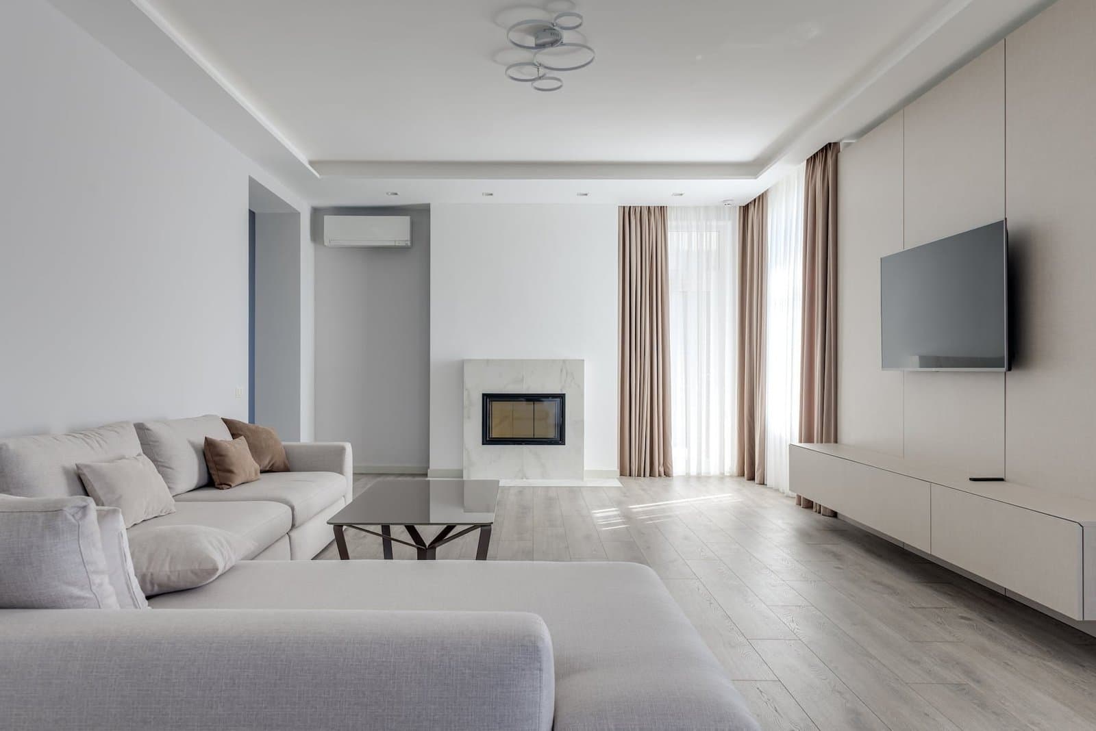 spacious lounge room with soft furniture