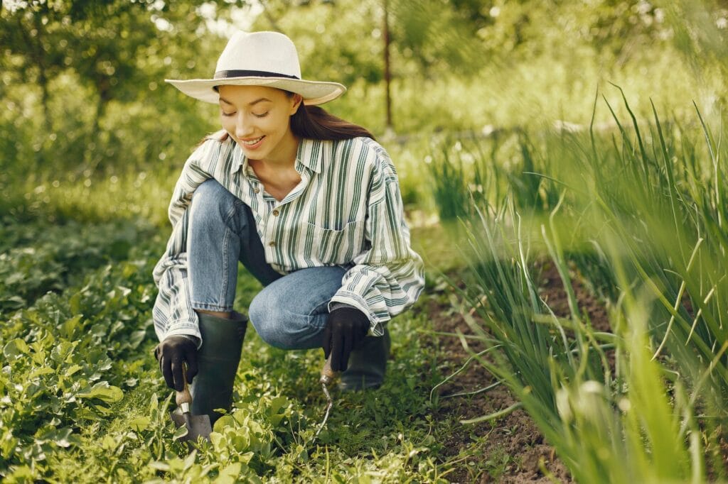 woman cultivating how to enjoy your land