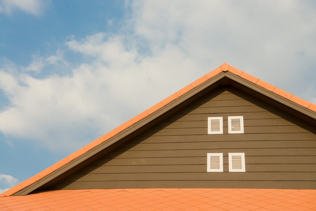 orange and gray painted roof buying your first investment property