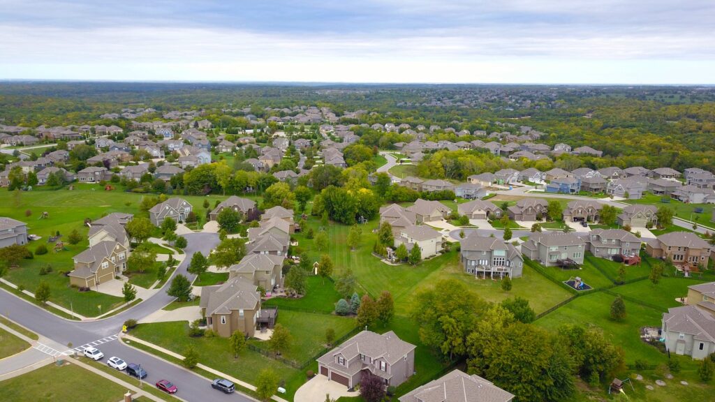 aerial photography of gray houses Sell Your Home