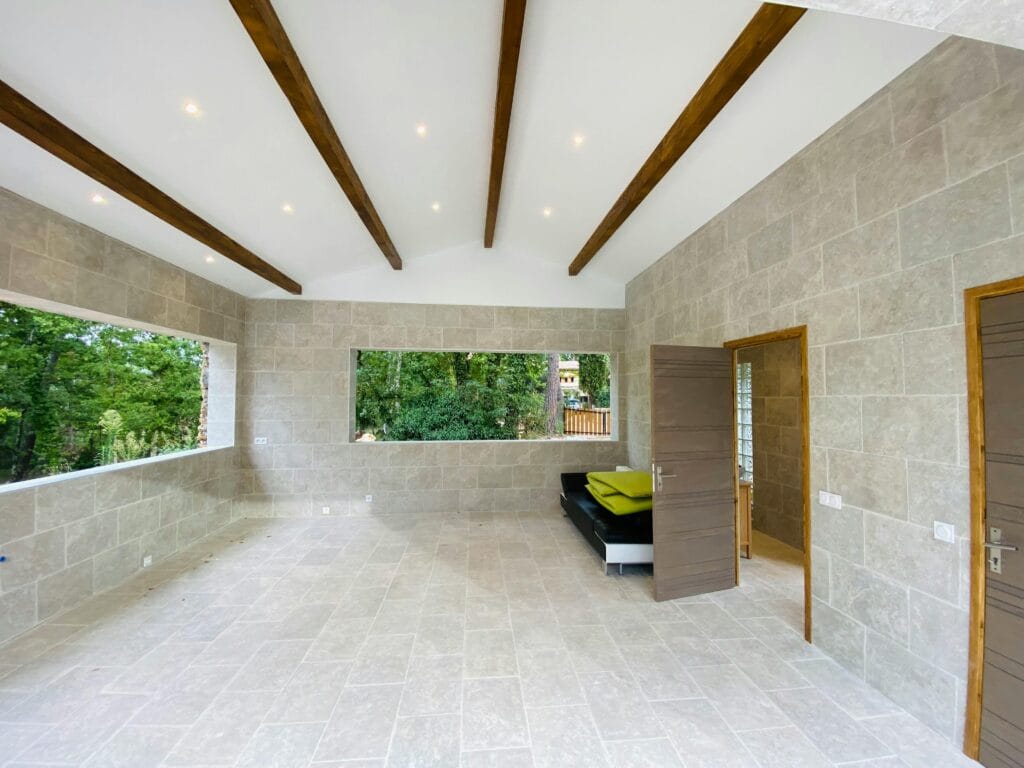Bright and airy interior space with modern design and large windows.